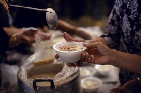 Feeding the poor. Poverty conceptの写真素材