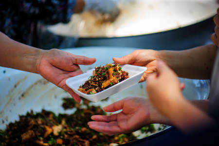 The society of helping to share food to the poorの写真素材