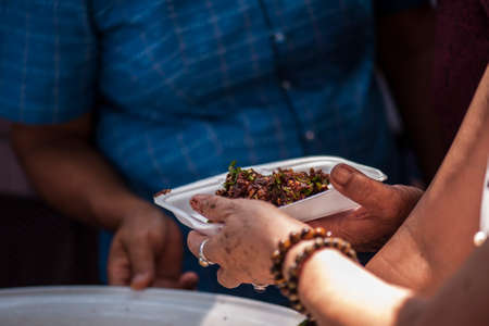 Feeding the poor Helping each other in societyの写真素材