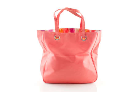 pink handbag isolated on white backgroundの写真素材