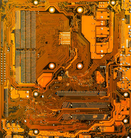 abstract yellow circuit motherboard technology backgroundの写真素材