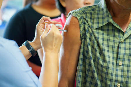 Patients received vaccines from doctors to prevent the disease. Medical conceptの写真素材