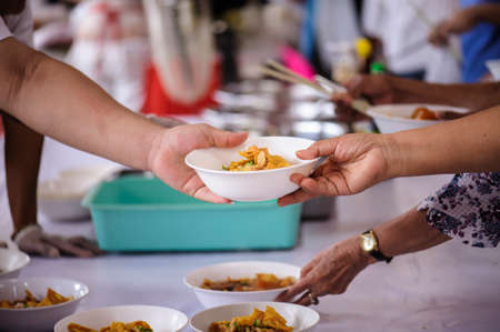 Feeding the hungry to get a taste for the poor Make humanitarian society : concept social...
