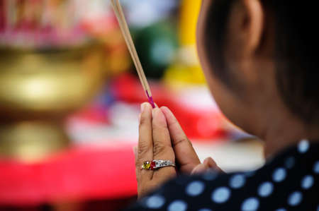 Worship by the incense of the Buddhistの写真素材