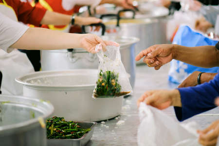Feeding the hungry to get a taste for the poor Make humanitarian society : concept social...