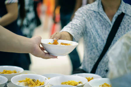 The donation is a hope for hungry people to fight : Care conceptの写真素材