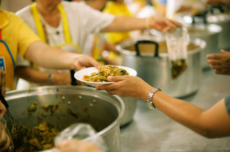 Share Food Helping Homeless People in Society on Earth: The Concept of Hunger Hungerの写真素材