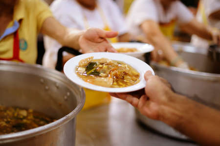 Donating food to beggars to alleviate hunger : the concept of sharing help to fellow human beings in...