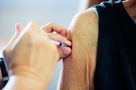Medical staff vaccinated against influenza to the public at arms : Concept treatment and prevention.の写真素材