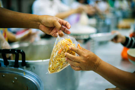 The Hope of the Poor by Donating Charity Food to the Immaculate : The Concept of Mindfulnessの写真素材
