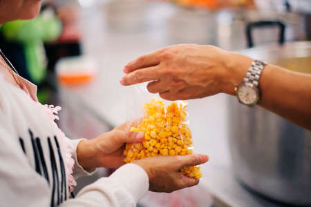 People outreach to donate food from volunteers : conceptual beggarの写真素材