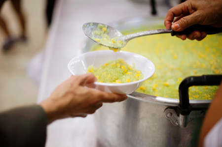 Free food for the poor and Food distributionの写真素材