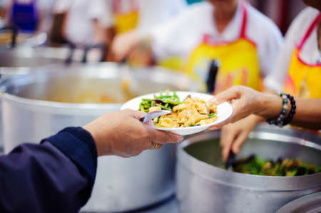 Free food for the poor and Food distributionの写真素材