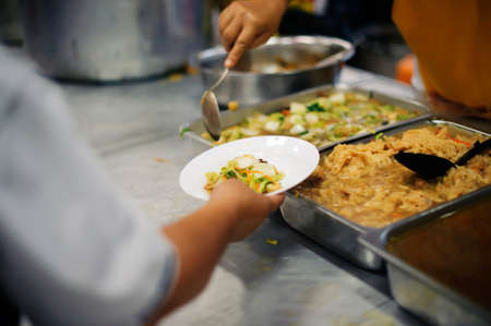 Warm food for the poor and homeless : concept giving with charityの写真素材
