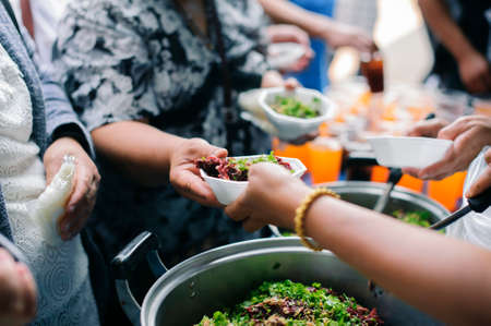 Donations to share food for people with starvation without moneyの写真素材