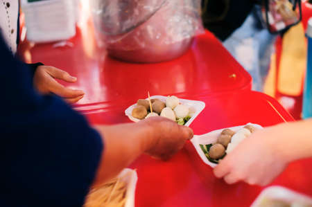 The hunger problem of the poor : homeless people receive food and charity.