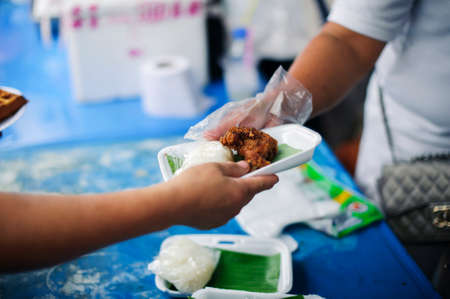 Food for the poor Society of Sharing : Sharing each other in societyの写真素材