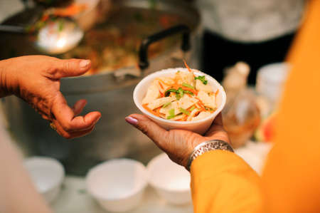 The donation is a hope for hungry people to fight : Care concept : From the philanthropist to helpの写真素材