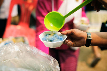 Social Problems of Poverty Helped by Feeding : Volunteer to Feed the Hungry in Society: The Concept of Donating Food to the Poor in Societyの写真素材