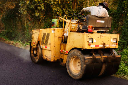 Heavy Vibration roller compactor at asphalt pavement works for road repairingの写真素材