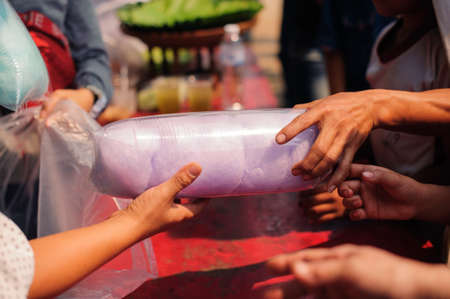 The Concept of Hunger Hunger : Sharing food with people in poor communities : The concept of feedingの写真素材