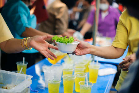 the concept of food shortage in the world : the economic downturn causes food shortages : Donate Food with Love and Hope to the Poor: The concept of food is essential to lifeの写真素材