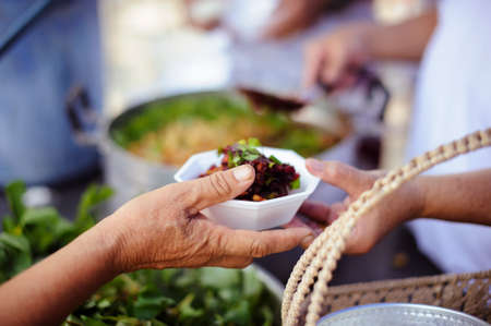 the concept of food shortage in the world : the economic downturn causes food shortages : Donate Food with Love and Hope to the Poor: The concept of food is essential to lifeの写真素材