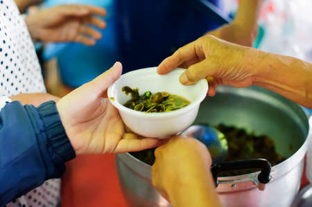 the concept of food shortage in the world : the economic downturn causes food shortages : Donate...