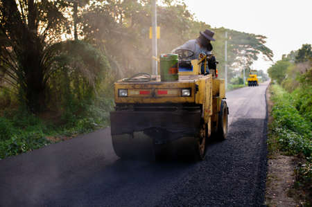 Heavy Vibration roller compactor at asphalt pavement works for road repairingのeditorial素材