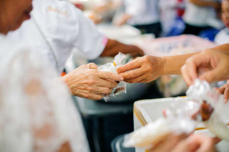 Charity food shared to everyone in society and the poor need this charity food : The Concept of Mindfulness : a social concept of sharing.の写真素材