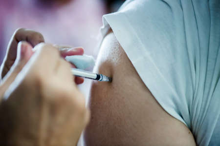 Patients are vaccinated from medical personnel: the concept of preventionの写真素材