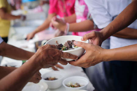 Social Problems of Poverty Helped by Feeding : The Concept of Donating Food to the Poor in Societyの写真素材