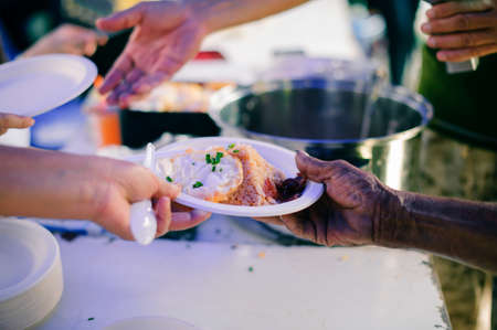 Donating food to the poor : People are experiencing a lot of poverty, Come and wait for free food