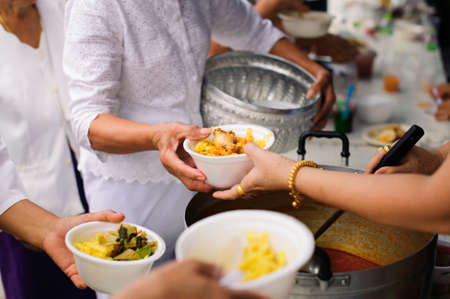 Donating food to the poor : People are experiencing a lot of poverty, Come and wait for free food