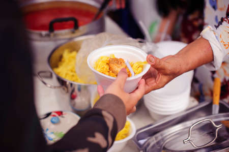 Donating food to the poor : People are experiencing a lot of poverty, Come and wait for free food
