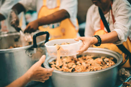 Food sharing with the homeless in society : concept of famine and charity food