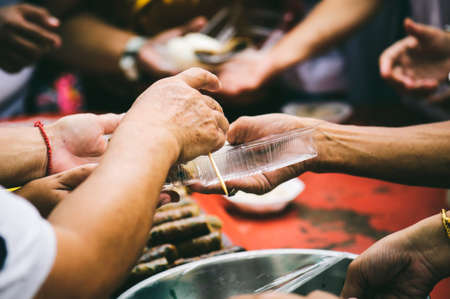 Starvation issues help with food donations: concept of givingの写真素材