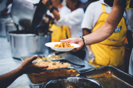 Free food for the homeless and the hungry: food donation conceptsの写真素材