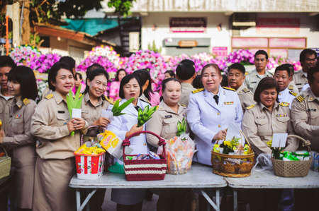 Chiang Mai, Thailand - OCTOBER 23, 2019: State enterprise employees in Saraphi District jointly offer food, drinks to Buddhist monks in Saraphi, Chiang Maiのeditorial素材