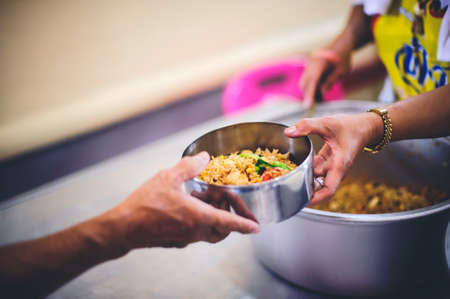 Food needs of the poor in Asia : beggars are asking for food from charitable food service providers