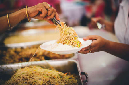 Food needs of the poor in Asia : beggars are asking for food from charitable food service providers