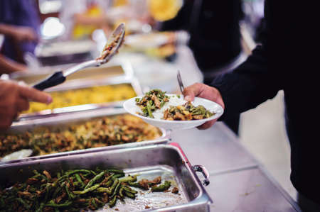 The poor are cared for by generous donations: the concept of food aidの写真素材