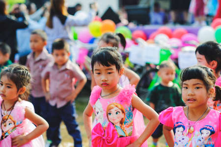 Chiang Mai, Thailand - JANUARY 11, 2020: Energetic Thai children join National Children's Day activities, receiving many prizes Including receiving food and beverages in Saraphi, Chiang Maiのeditorial素材