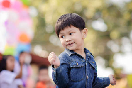 Chiang Mai, Thailand - JANUARY 11, 2020: Energetic Thai children join National Children's Day activities, receiving many prizes Including receiving food and beverages in Saraphi, Chiang Maiのeditorial素材