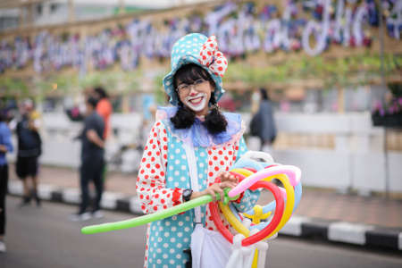 CHIANG MAI, THAILAND - FEBRUARY 08, 2020: Young women dressed in beautiful fancy dresses join the parade at the 44th flower festival parade in Chiang Mai, Thailandのeditorial素材