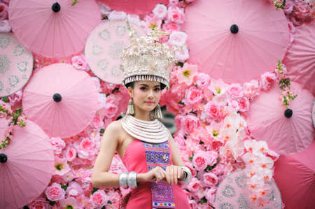 CHIANG MAI, THAILAND - FEBRUARY 08, 2020: Traditionally dressed woman in procession on Chiang Mai 44th Flower Festival in Chiang Mai, Thailand;のeditorial素材