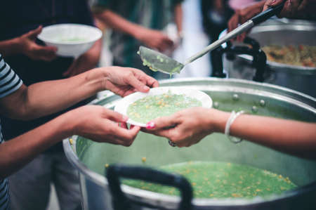 Free food for the homeless and the hungry: food donation conceptsの写真素材