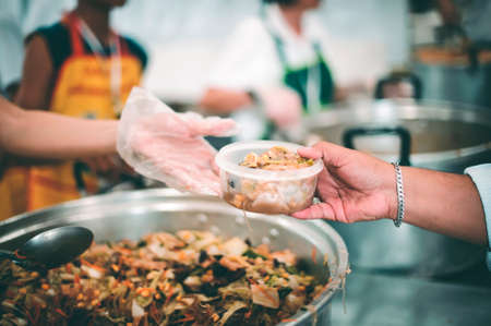 Free food donation to the poorの写真素材