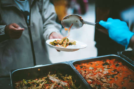 Donate food to the poor : Poverty concept