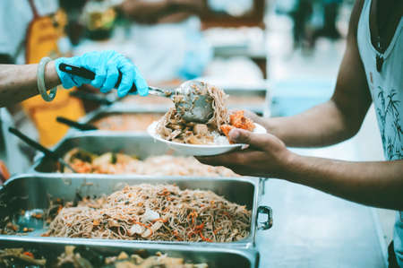 Donate food to the poor : Poverty conceptの写真素材